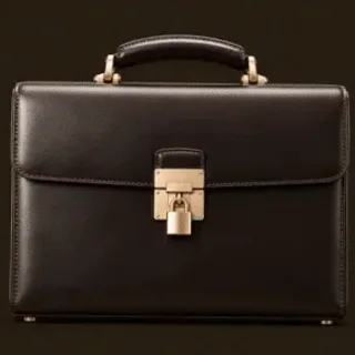 Locked leather briefcase — Vegas Nova Casino